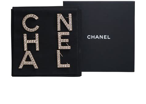 chanel brooch letter|Chanel costume jewelry.